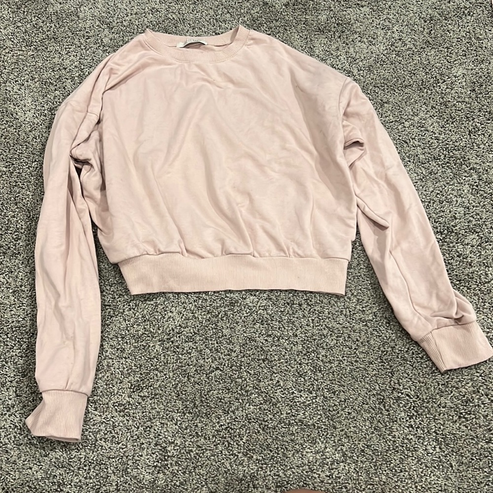 light pink sweater size large but not large AT ALL super cute and simple